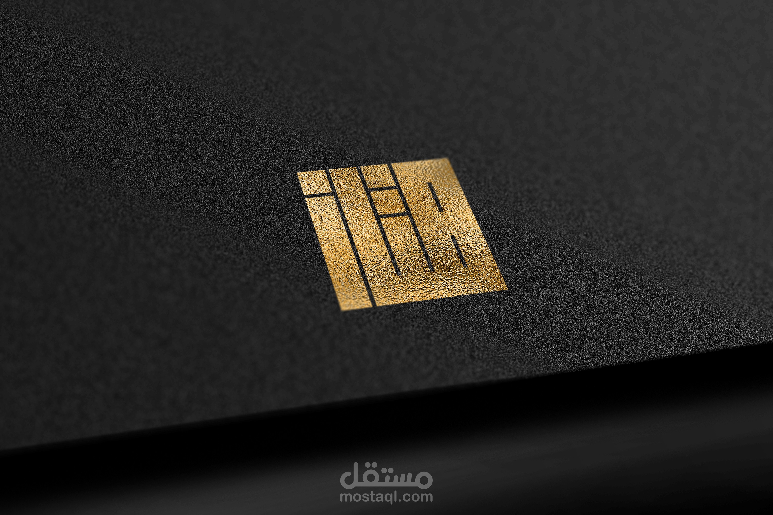 تصميم شعار بالخط الكوفي المربع باسم (ممتاز).