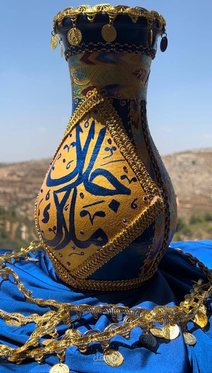 تصميم و رسم وكتابة على فخارات