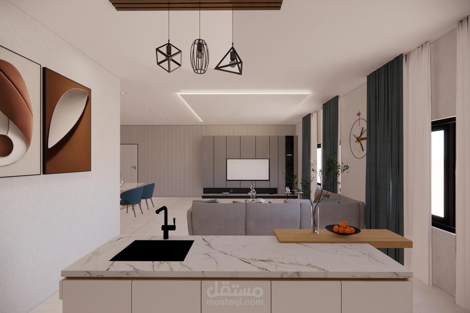 تصميم داخلي متناغم لمطبخ ومنطقة طعام ومعيشة بطابع عصري بسيط