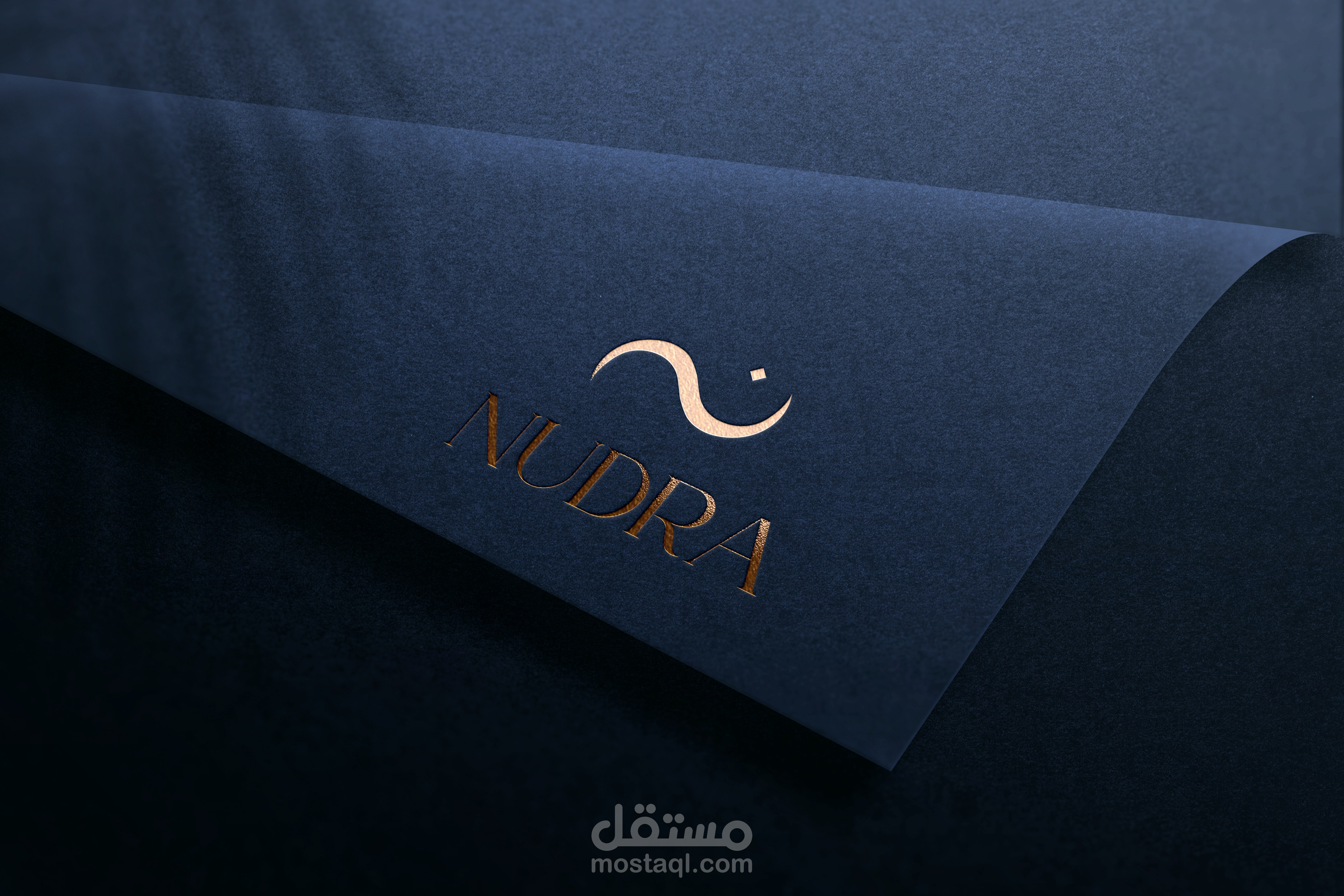 Nudra perfume logo