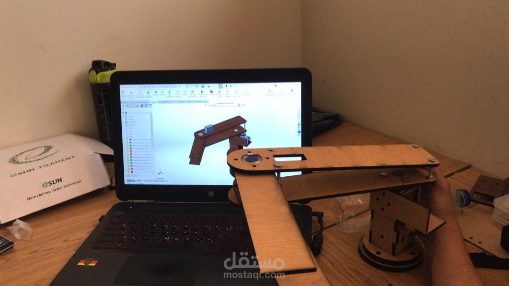 robot arm playing chess