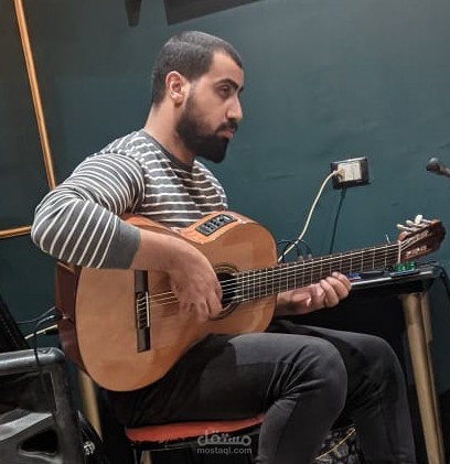 عازف جيتار و مدرب جيتار