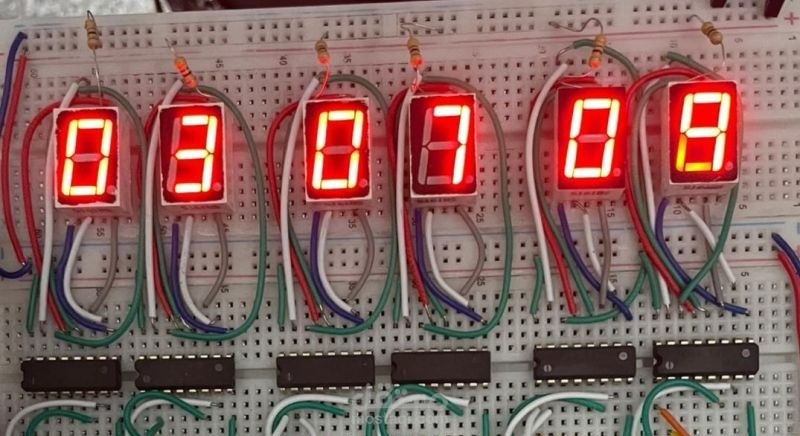 ساعة رقمية باستخدام البوابات المنطقية (Digital Logic Gates)