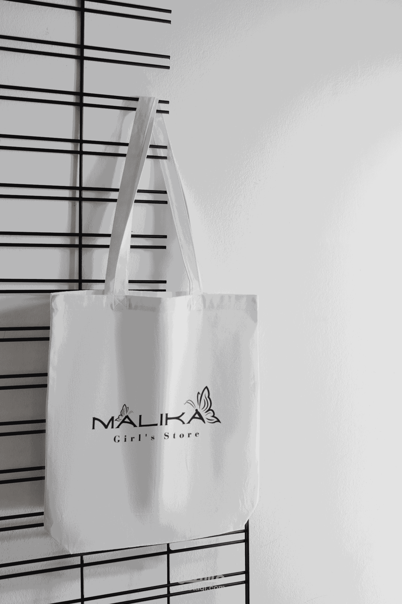 malika store logo
