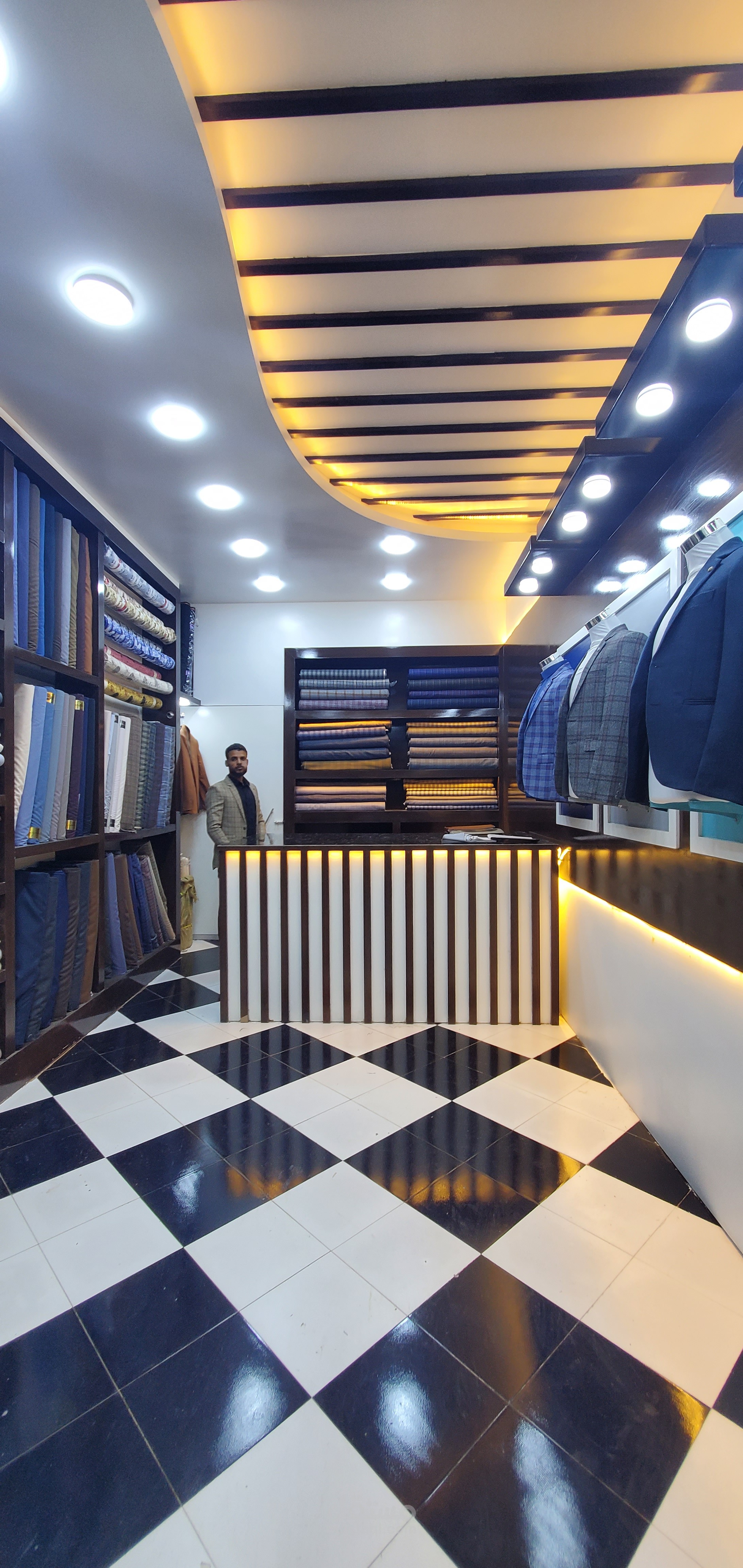 تصميم وتنفيذ ديكور محل خياطة