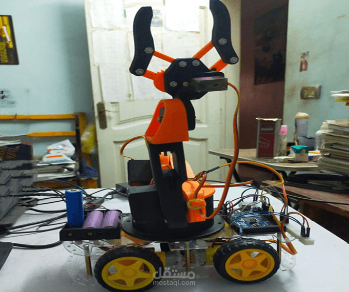 Smart Car with Robotic Arm