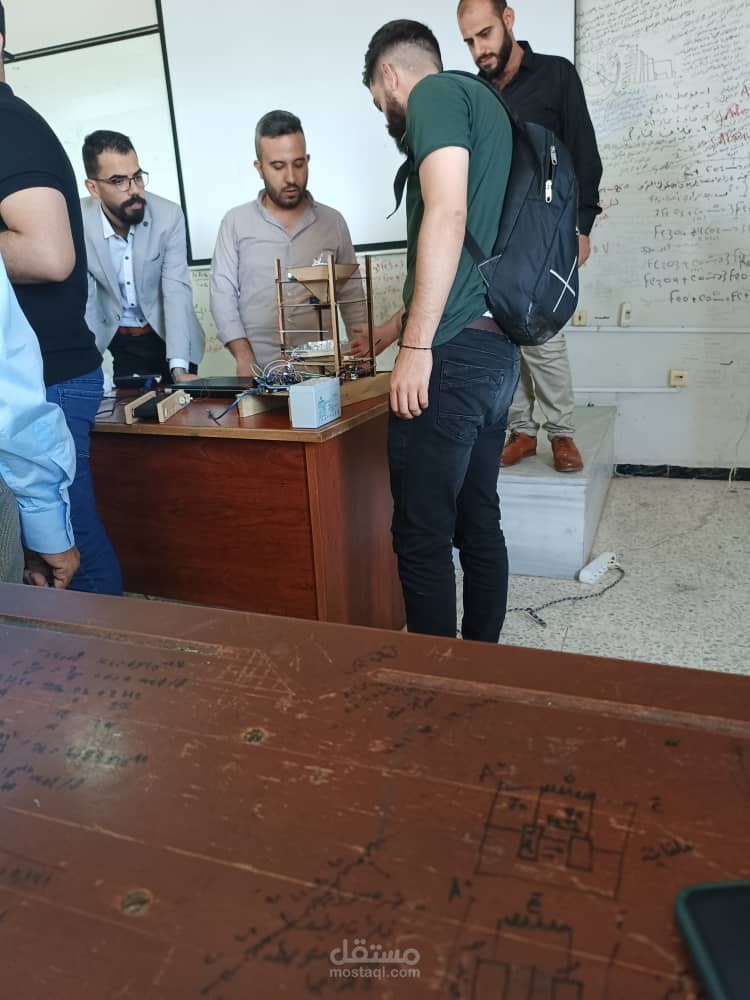مشروع الة تعبئة و تغليف عبر الاردوينو بوجود حساس لتخفيف تدخل اليد البشرية