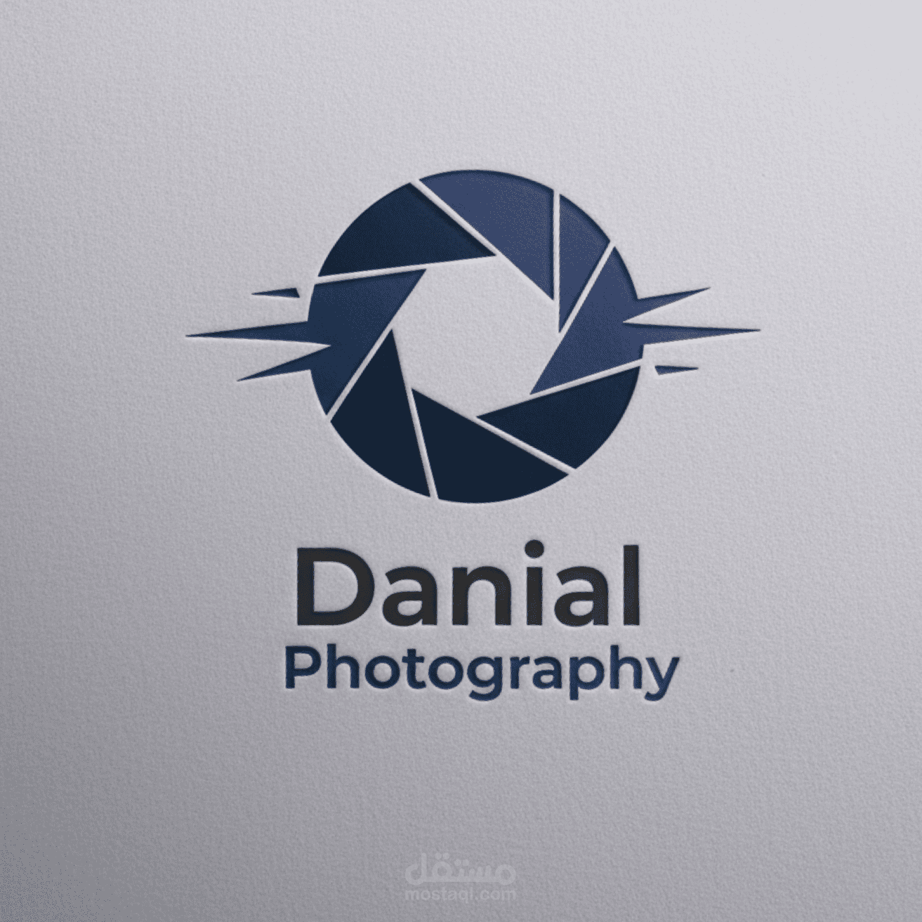 تصميم شعار لاستوديو تصوير بتدرجات الأزرق