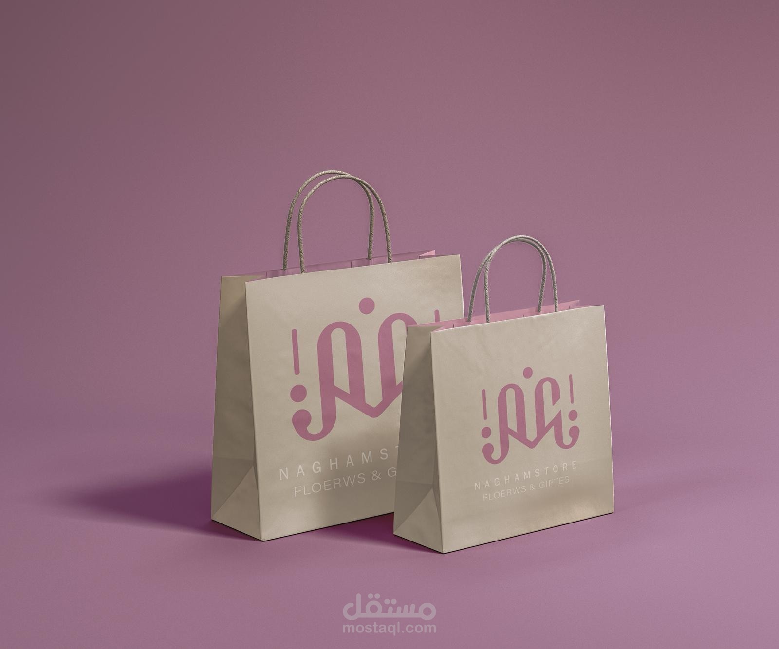 أكياس تسوق ورقية مع الشعار