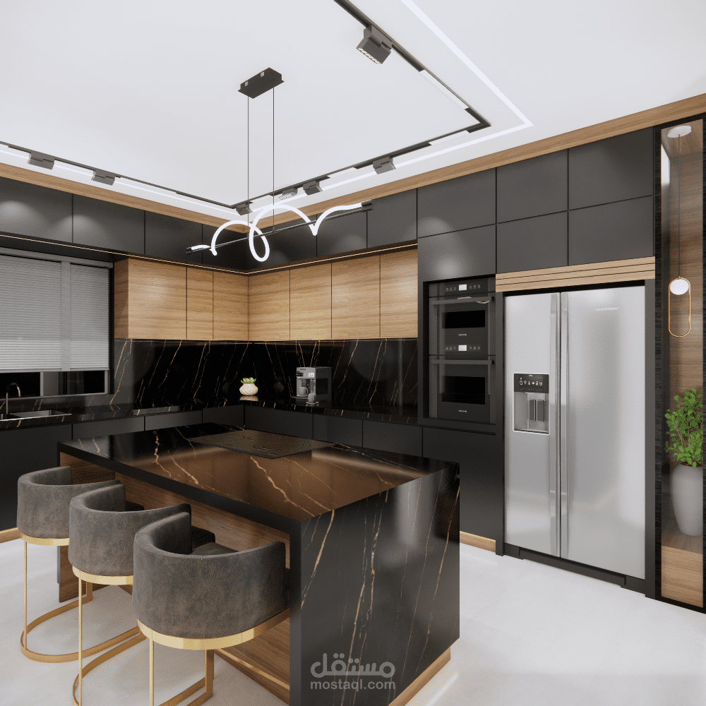 تصميم داخلي لمطبخ مودرن مع جزيرة مركزية وخامات فاخرة