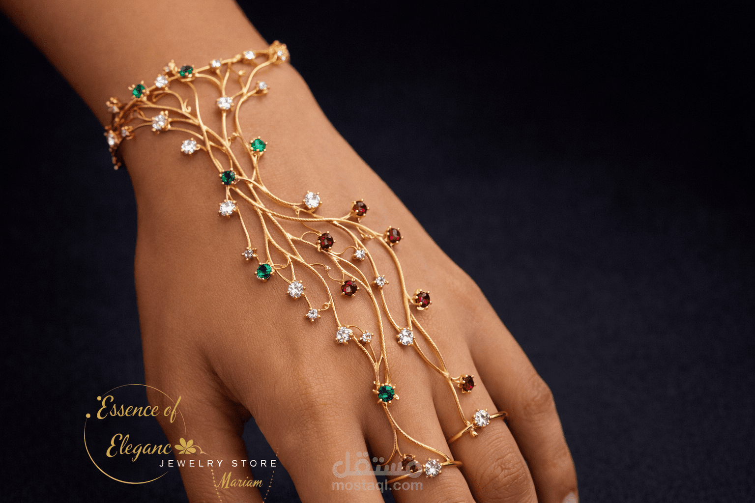 عناق الأغصان: سوار كف (Hand Harness) بتصميم شجري مرصع بالأحجار الكريمة.