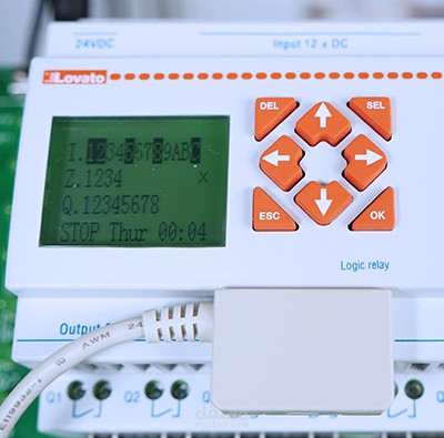 عمل برنامج PLC لمراقبة تعبئة خزان لعملية صناعية