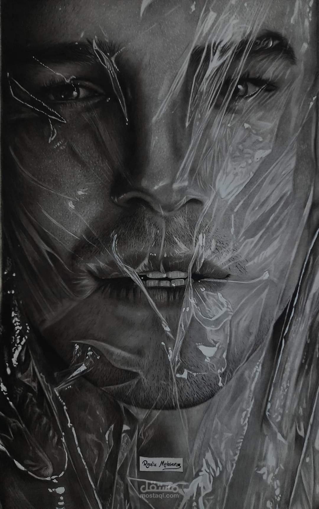 بورتريه واقعي بالفحم والرصاص