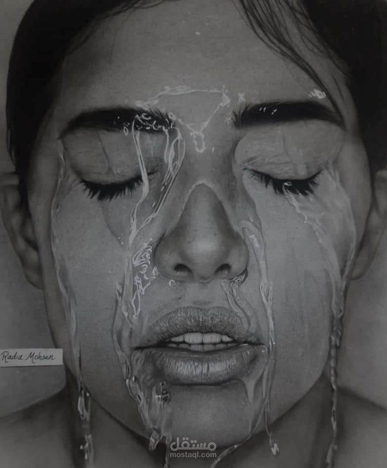 بورتريه واقعي بالفحم والرصاص